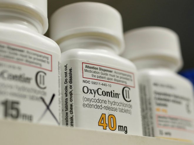 Podjetje Purdue Pharma kot proizvajalko sredstva oxycontin pogosto obtožujejo največje odgovornosti za nevarno krizo opioidov. FOTO: REUTERS/George Frey&nbsp;
