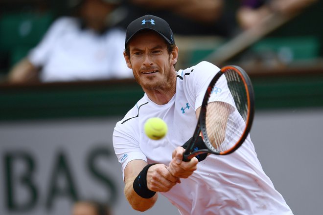 Andy Murray naj bi sredi meseca nastopil na turnirju v Queen&#39;su. FOTO AFP