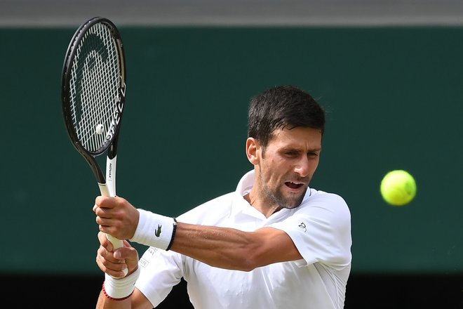 Novak Đoković bo favorit v finalu, v katerem bo skušal ubraniti naslov. FOTO: AFP