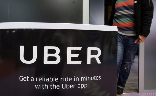 Aktualna vlada se sicer vprašanja Uberja loteva počasi. FOTO: Reuters
