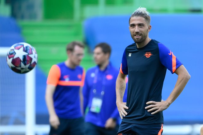 Slovenski nogometaš Kevin Kampl se je pri Leipzigu uveljavil kot eden od nosilcev igre. FOTO: Lluis Gene/AFP