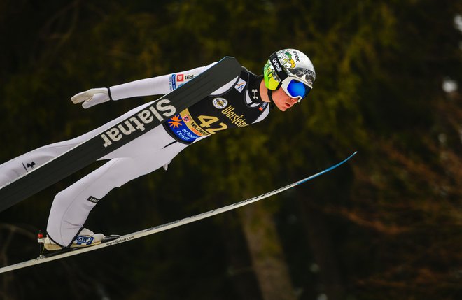 Anže Lanišek je priskakal Sloveniji sedmo kvoto za nastope v svetovnem pokalu. FOTO: Sascha Schuermann/AFP