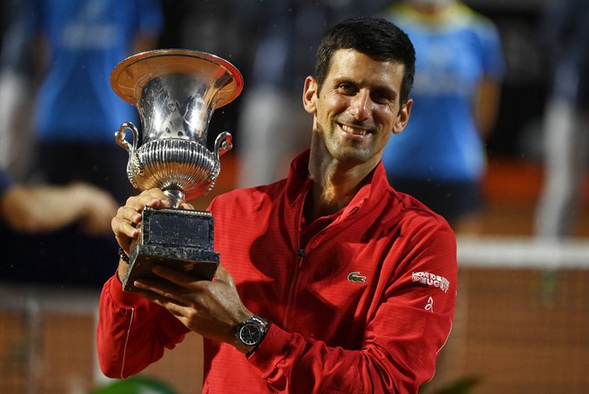 Novak Đoković si je z lovoriko vsaj delno zacelil rane iz New Yorka. FOTO: Riccardo Antimiani/Reuters