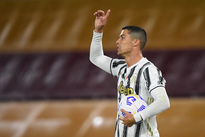Cristiano Ronaldo je daleč najučinkovitejši nogometaš v zgodovini lige prvakov. FOTO: Alberto Lingria/Reuters