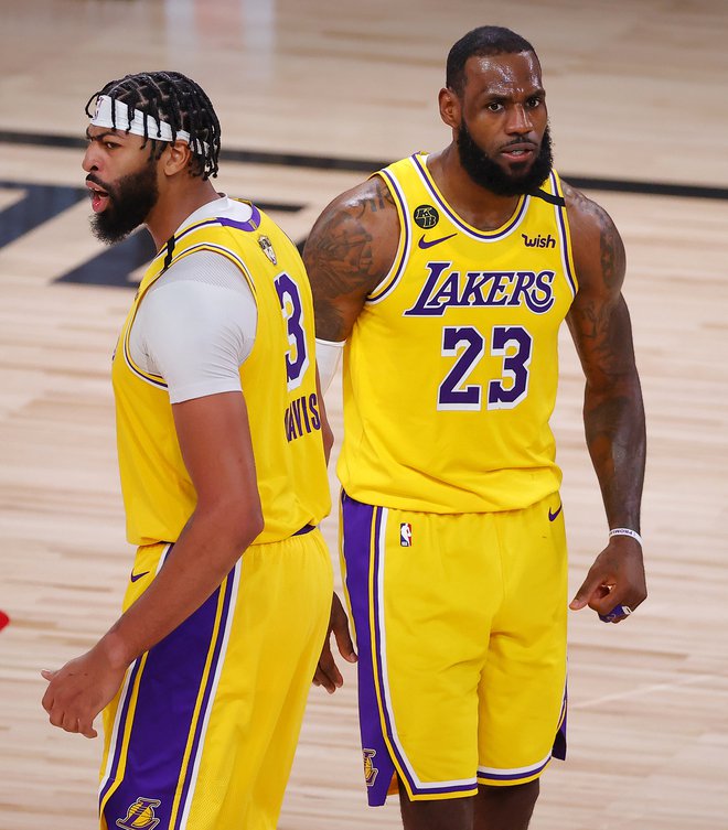 Ko sta Anthony Davis (levo) in LeBron James v svojem ritmu, so LA Lakers neustavljivi. FOTO: Kevin C. Cox/AFP