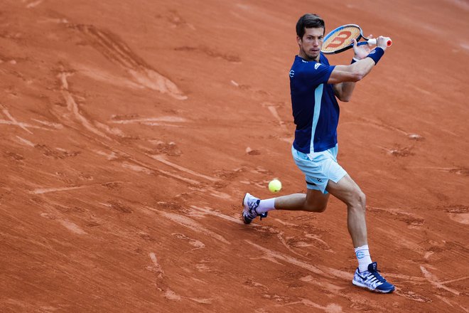 Aljaž Bedene se je trudil po najboljših močeh, a mu je boljšo predstavo proti Stefanosu Tsitsipasu preprečila poškodba gležnja.<br />
FOTO: Thomas Samson/AFP