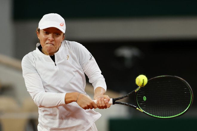 Poljakinja Iga Šwiatek je presenetila favorizirano Romunko Simono Halep. FOTO: Thomas Samson/AFP