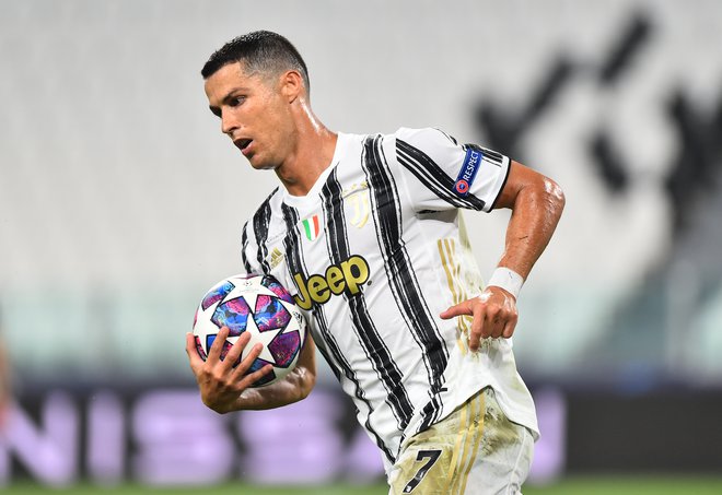 Cristiano Ronaldo je udarni zvezdnik tako Juventusa kot tudi portugalske reprezentance. FOTO: Massimo Pinca/Reuters