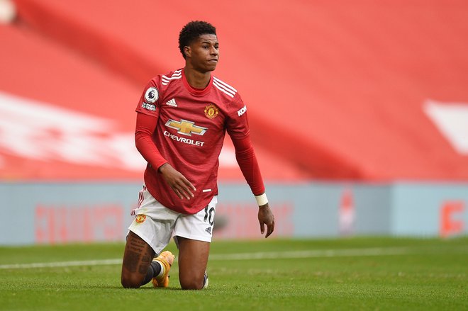 Napadalec Manchester United Marcus Rashford se je v obdobju pandemije covida-19 odlikoval s humanitarno dejavnostjo. FOTO: Oli Scarff/Reuters