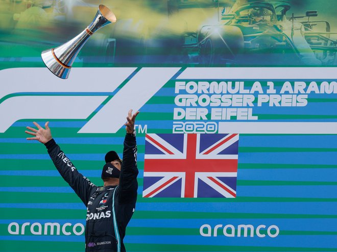 Britanski voznik formule Lewis Hamilton 1 je izenačil tudi rekord Michaela Schumacherja. FOTO: Ronald Wittek/AFP