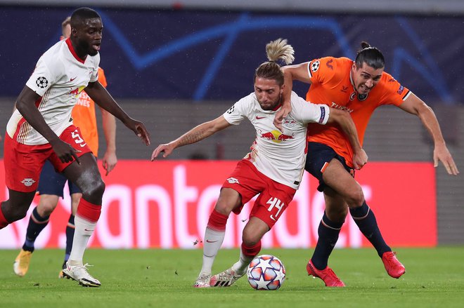 Kevin Kampl se je s soigralci iz Leipziga veselil prvih točk v novi sezoni lige prvakov. FOTO: Ronny Hartmann/AFP