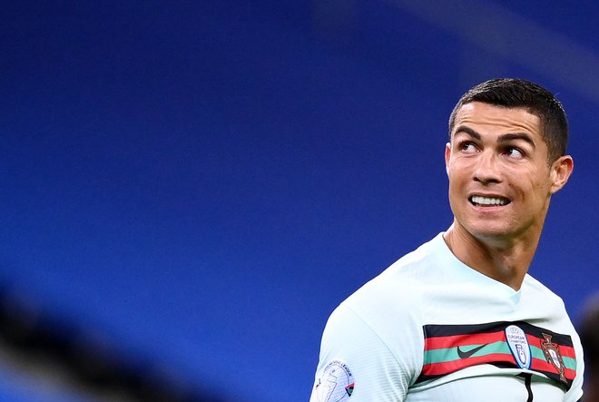 Cristiano Ronaldo se bo ta konec tedna po treh tednih osamitve vrnil v tekmovalni ritem, potem ko se je okužil s koronavirusom. FOTO: Franck Fife/AFP