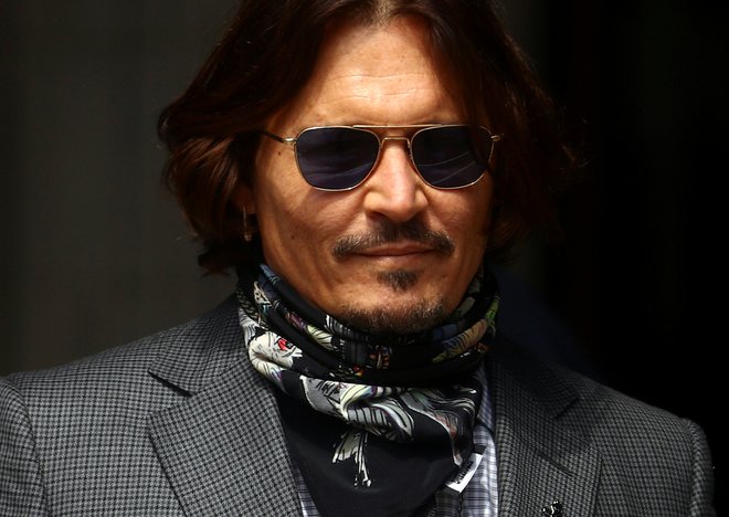 Johhny Depp in njegova nekdanja soproga Amber Heard sta se spoznala leta 2011 med snemanjem filma <em>Zapiti dnevnik</em>. FOTO: Hannah Mckay/Reuters