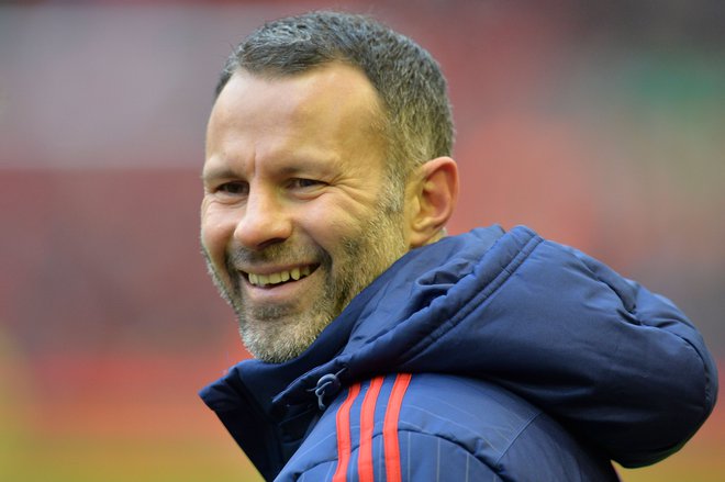 Ryan Giggs je bil na igrišču vselej umirjen nogometaš, zunaj njega in v zasebnem življenju pa je vse prej kot angel. FOTO: Paul Ellis/AFP