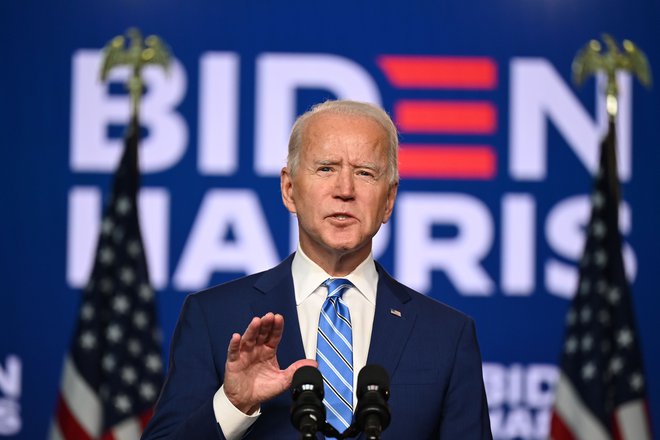 Demokratski predsedniški kandidat Joe Biden med govorom v domačem delawarskem Wilmingtonu. Foto Jim Watson Afp