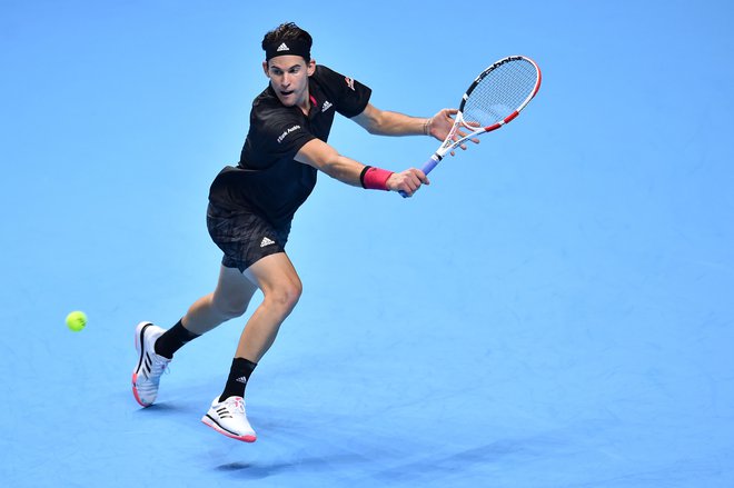 Dominic Thiem je prišel do dragocene zmage po dveh urah in 26 minutah hudega boja. FOTO: Glyn Kirk/AFP