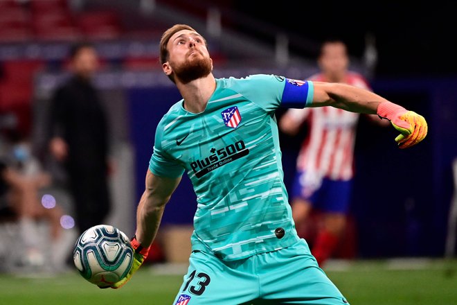 Jan Oblak je ustavil štiri strele Barcelone in se veselil pomembne zmage. FOTO: Javier Soriano/AFP