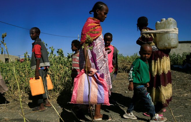 Begunci iz Tigreja na etiopsko-sudanski mej. FOTO: Mohamed Nureldin Abdallah/Reuters