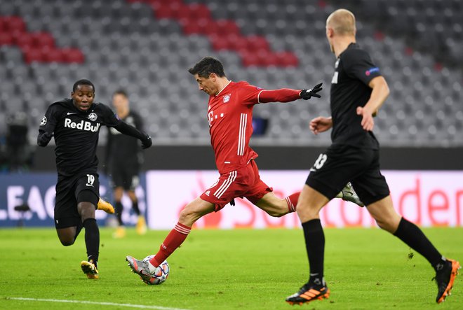 Robert Lewandowski je tretji najboljši strelec v zgodovini lige prvakov. FOTO: Andreas Gebert/Reuters