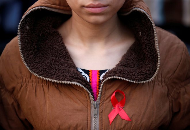 Umrli so trije ljudje z virusom HIV, nobeden zaradi aidsa. FOTO: Navesh Chitrakar/Reuters
