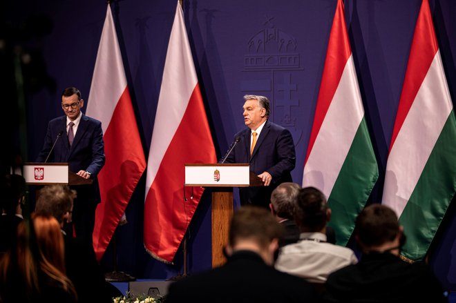 Predsednika madžarske in poljske vlade, Viktor Orbán in Mateusz Morawiecki, sta v zadnjih tednih opravila več posvetovanj.&nbsp; FOTO: Zoltan Fischer/Reuters