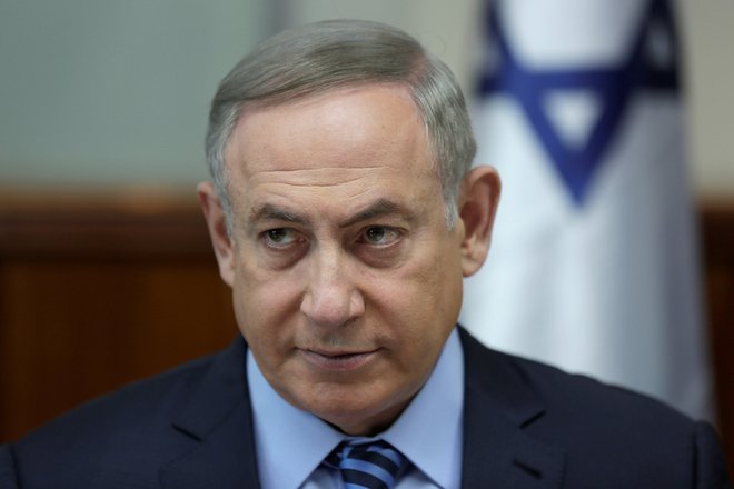 Izraelski premier Benjamin Netanjahu bi bil rad prvi, ki se bo v državi cepil s cepivom proti covid-19. FOTO: Reuters Pictures