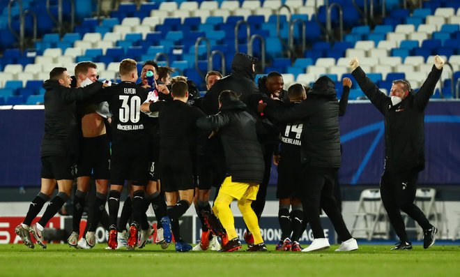 Borussia je izgubila proti Realu, vendar pa ji to ni pokvarilo veselja ob napredovanju. FOTO: Sergio Perez/Reuters