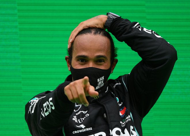 Lewis Hamilton se bo konec tedna vrnil v karavano formule ena. FOTO: Rudy Carezzevoli/Reuters