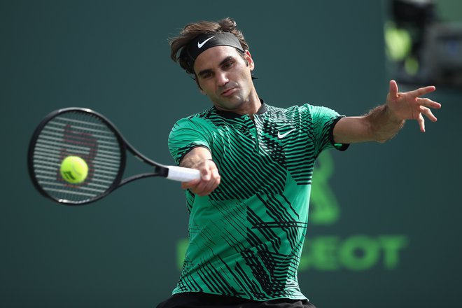 Roger Federer je v svoji bogati teniški karieri osvojil kar 20 naslovov na turnirjih za grand slam. FOTO: Julian Finney/AFP