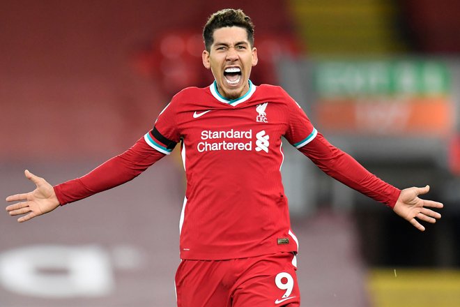 Roberto Firmino je bil junak tekme v Liverpoolu.FOTO: Peter Powell/AFP