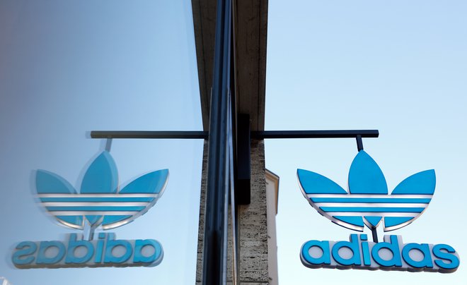 Adidas tehta, kaj storiti z naložbo v Reebok. FOTO: Axel Schmidt/Reuters