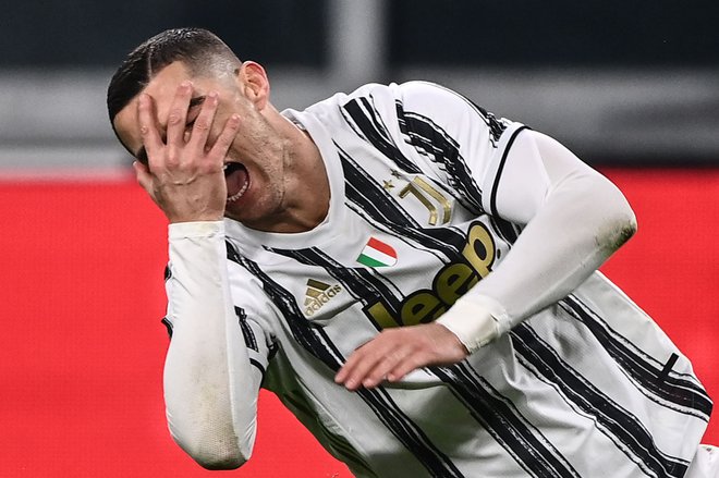 Cristiano Ronaldo ni mogel preprečiti poloma Juventusa. FOTO: Marco Bertorello/AFP