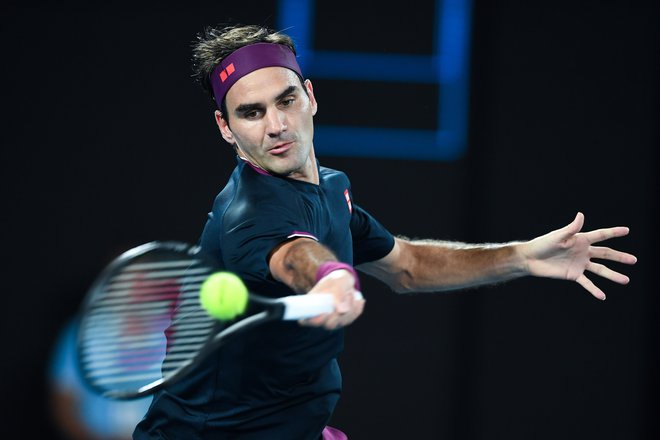 Roger Federer bo zavoljo okrevanja izpustil prvi grand slam sezone. FOTO: Greg Wood/AFP