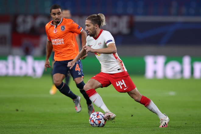 Kevin Kampl se bori z bolečinami v kolenu, zato še ni jasno, če bo danes nared za derbi Leipziga in Dortmunda. FOTO: Ronny Hartmann/AFP