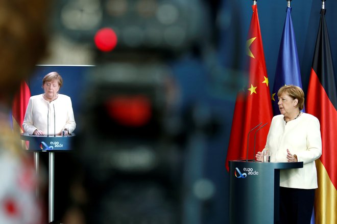 Po prepričanju Angele Merkel je v evropskem strateškem interesu sodelovati z velesilo 21. stoletja. FOTO: Michele Tantussi/Reuters