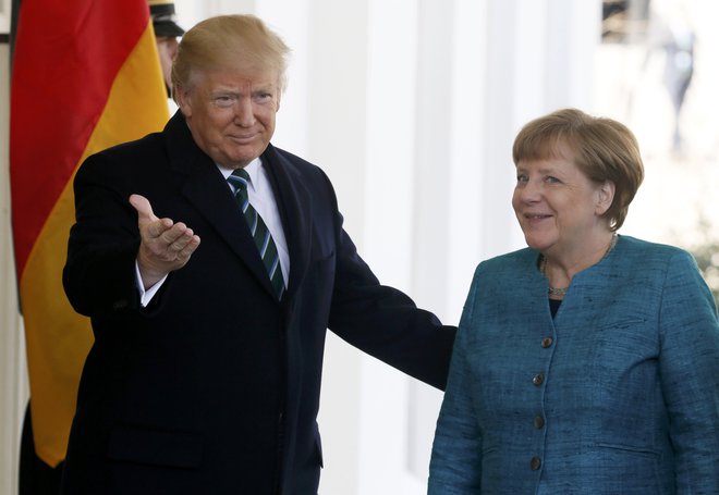 Angeli Merkel se je obrestovala stoična potrpežljivost v odnosih z Donaldom Trumpom. FOTO: Jim Bourg/Reuters