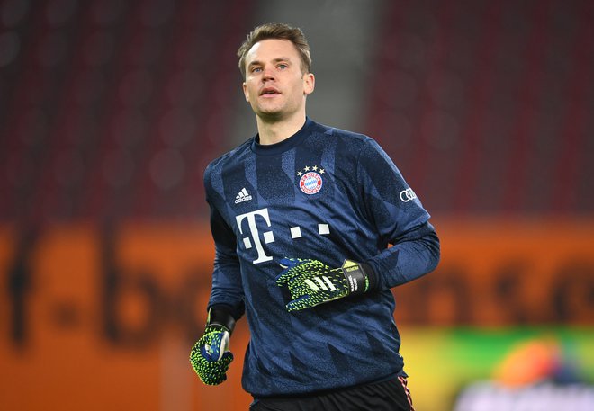 Manuel Neuer si deli rekord po številu nedotaknjenih mrež v nemškem prvenstvu. FOTO: Andreas Gebert/Reuters