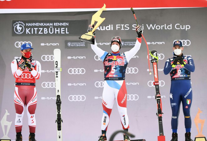 Najhitrejša trojica v Kitzbühlu: Matthias Mayer, Beat Feuz in  Dominik Paris (z leve). FOTO: Helmut Fohringer/AFP