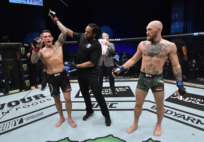 Dustin Poirier (levo) se je oddolžil Conorju McGregorju za poraz izpred dobrih šestih let. FOTO: Jeff Bottari/Usa Today Sports