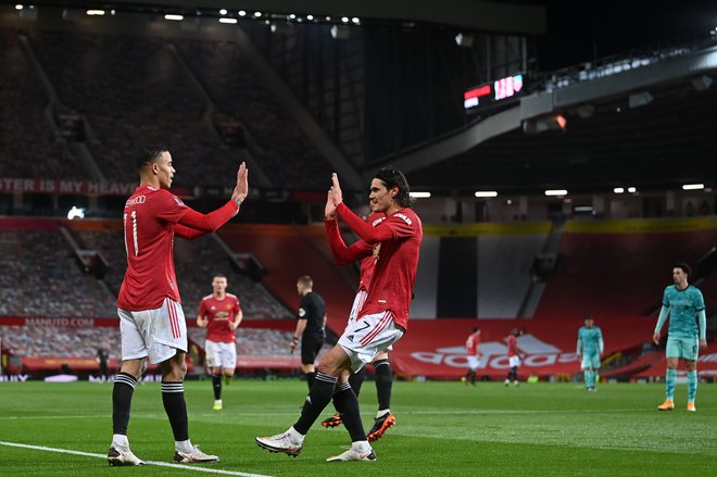 Nogometaši Manchester Uniteda so se posebej veselili napredovanja v pokalu, saj so ugnali velike tekmece iz Liverpoola. FOTO: Laurence Griffiths/AFP