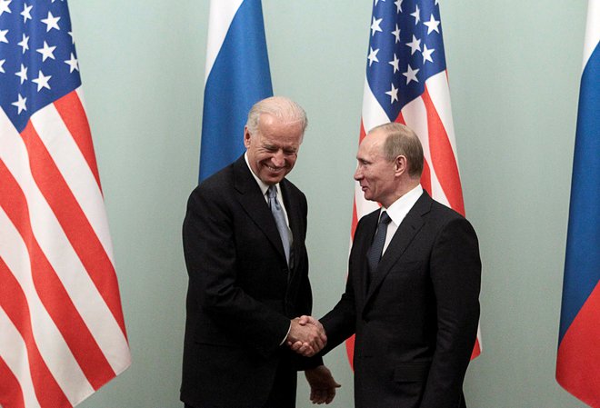 Vladimir Putin in Joe Biden. FOTO: Alexander Natruskin/Reuters