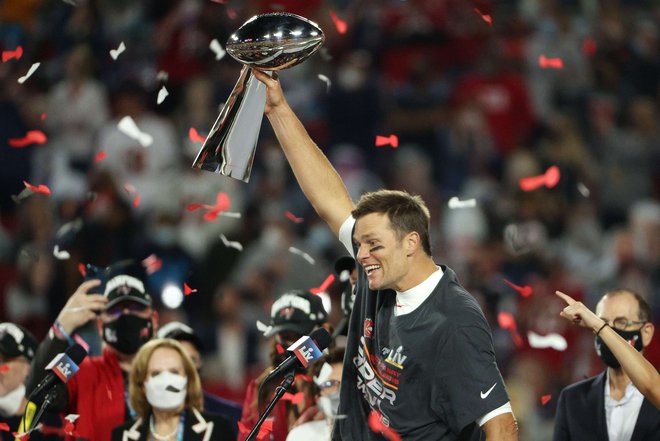 Tom Brady ostaja kralj med podajalci v NFL. FOTO: Patrick Smith/AFP