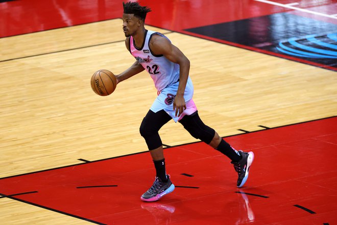 Jimmy Butler je v Houstonu dosegel prvi trojni dvojček sezone. FOTO: Carmen Mandato/AFP