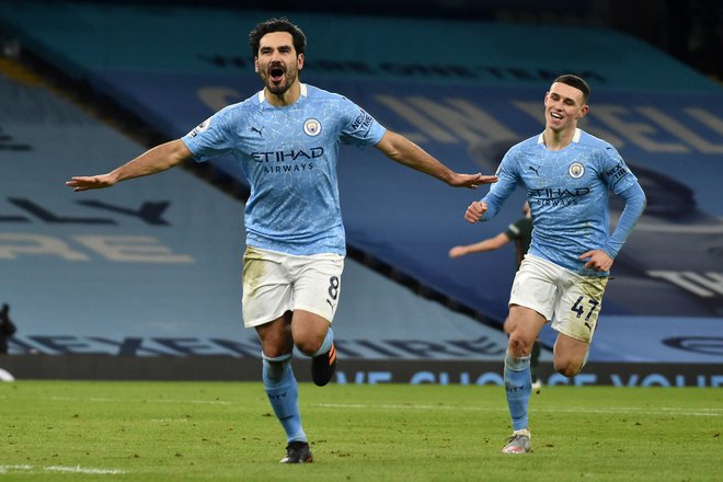 Ilkay Gundogan je dosegel dva izmed treh golov Manchester Cityja, dvboboj pa predčasno končal zaradi poškodbe. FOT: Rui Vieira/AFP