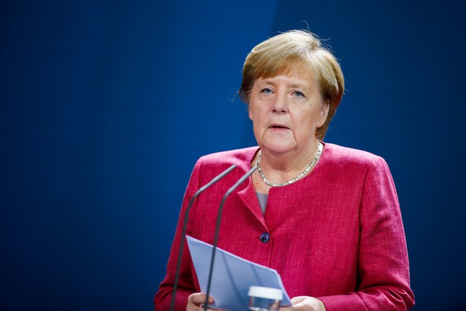 Angela Merkel je napovedala strožje ukrepe. FOTO: Axel Schmidt, Reuters