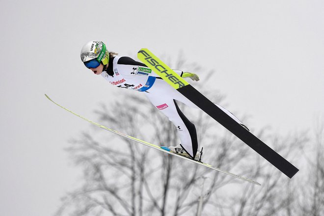 Nika Križnar je že šestič v tej sezoni skočila na zmagovalni oder. FOTO: Alex Nicodim/AFP