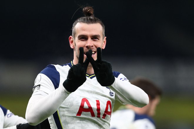 Gareth Bale je po selitvi v London spet odkril vrhunsko formo. FOTO: Clive Rose/AFP