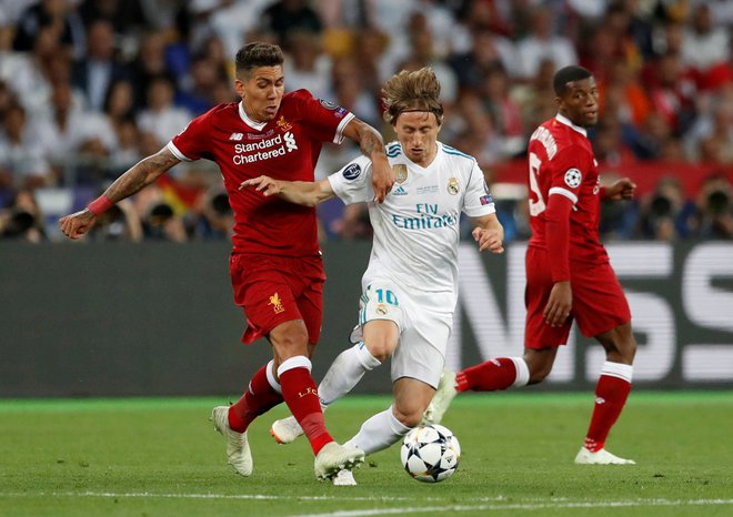 Luka Modrić se bo tako kot pred tremi leti v finalu zdaj v četrtfinalu lige prvakov pomeril z Liverpoolom, toda še prej bo s hrvaško reprezentanco gostoval pri nas. FOTO: Andrew Boyers/Reuters