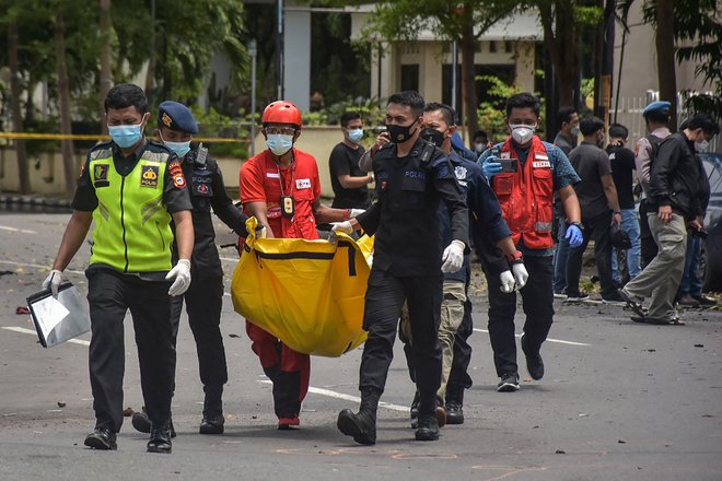 Napad se je v Indoneziji zgodil na cvetno nedeljo. FOTO: Indra Abriyanto/AFP