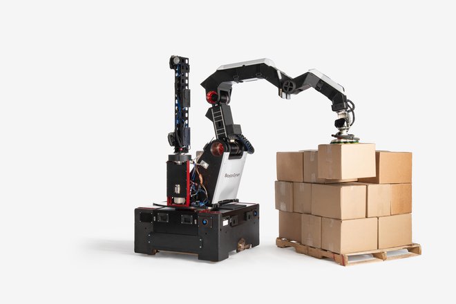 Stretch, najnovejši robot bostonskega podjetja, lahko naenkrat dvigne 20 kilogramov težek paket. FOTO: Boston Dynamics